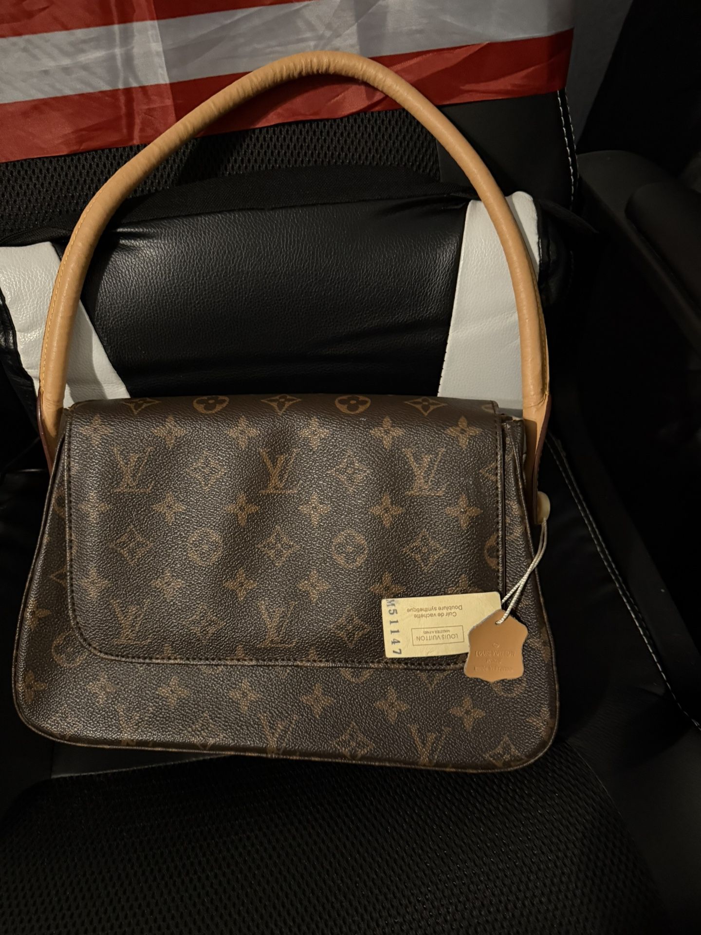 Louis Vuitton looping leather handbag make offer