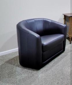 Leather swivel barrel chair (natuzzi)