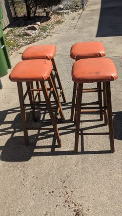 LOT OF 4 VINTAGE ORANGE BAR STOOLS MAKE OFFER