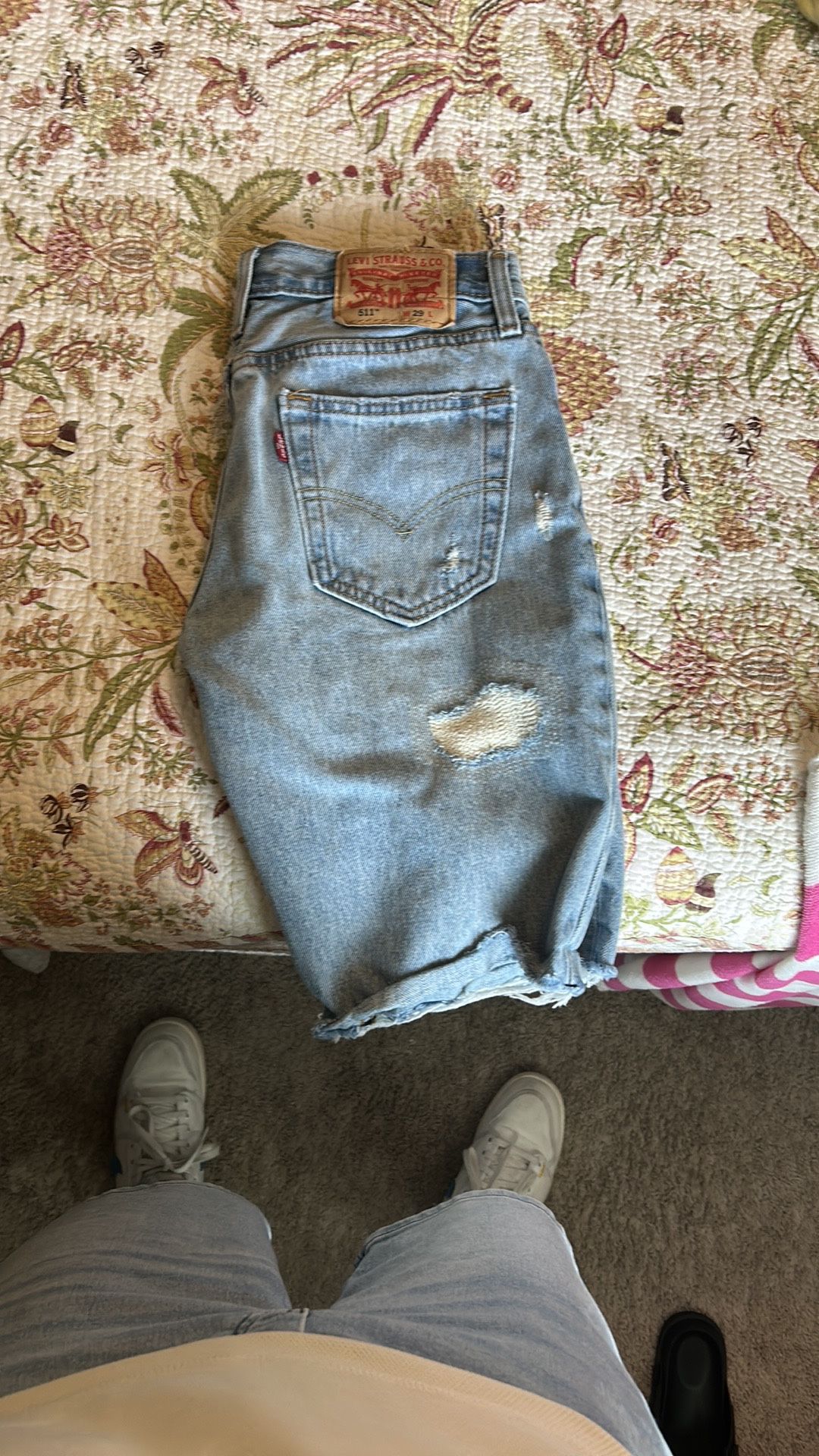 Levi's Faded Blue Denim with Distressed Details