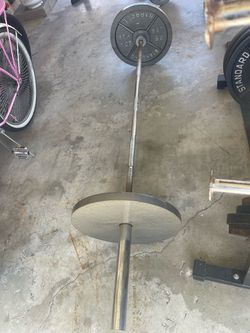 Olympic Bar & (2 ) 45 lb plates