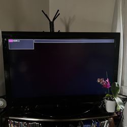 55” Toshiba Flat Screen Tv with Stand & Remote