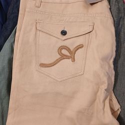 Brand New rocawear jeans Brand New Maximilian olive shorts and Brand new loose fit dickies all size 44 32