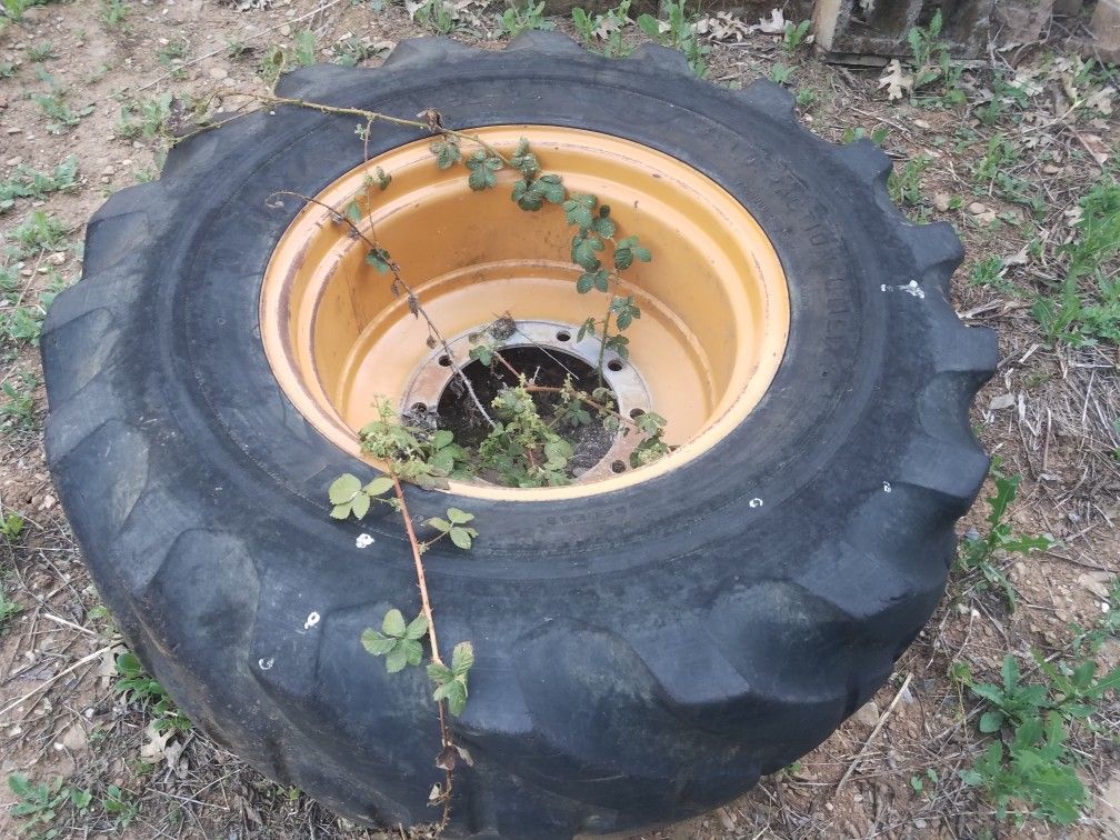 Case backhoe rim and tire