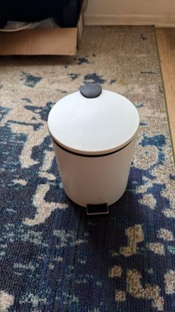 Cute white trashcan