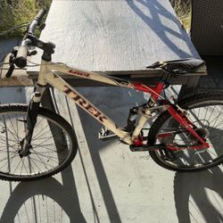 Trek Fuel 80 is a 26-inch wheel, aluminum-frame full-suspension mountain bike