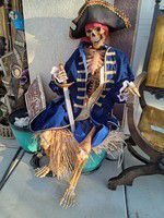 Pirate that sits on the treasure Duplicate at Disneyland