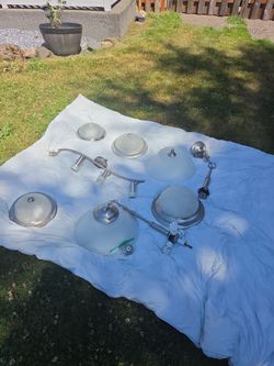 7 silver and white light fixtures