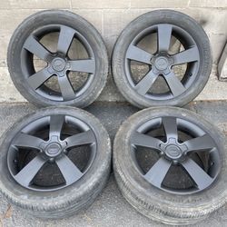 Black Chevy Equinox 18 inch stock wheels. 5 on 115mm 