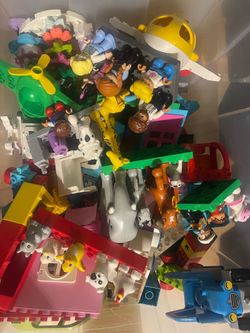 Large bin of Lego Duplo. Cars, planes, animals, people,