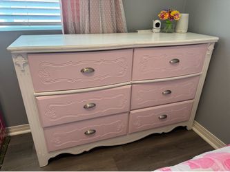Pink and white dresser