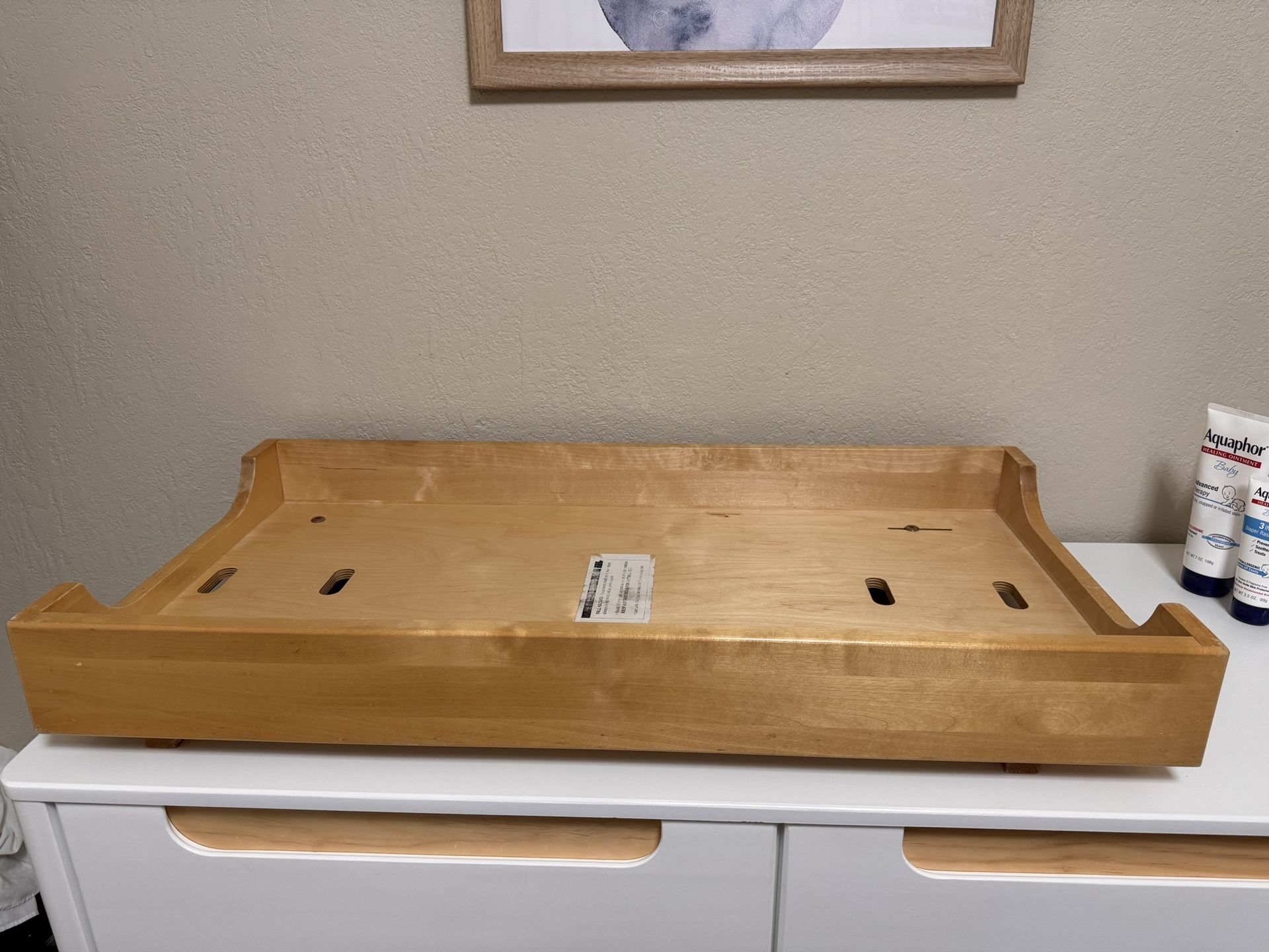 Wood changing station for nursery room