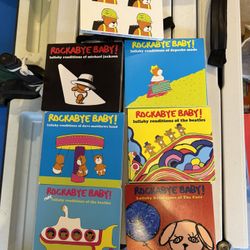 Rockabye Baby CDs (7)