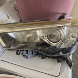 Toyota 4runner headlight drivers side