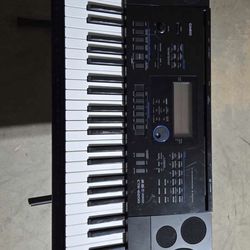 Casio CTK-6200 portable keyboard, featuring 61 piano-style keys.