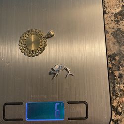 14 Karat Yellow Gold religious metal with 14 karat white gold marlin