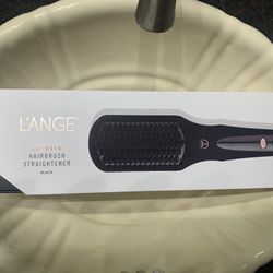 L’ange LeVite hairbrush straightener and several products