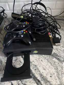 Xbox 360 slim with 2 controllers/Kinect/plus
