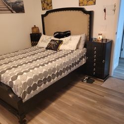 Queen ASHLEY COMPLETE BED W MATTRESS. ONLY 8 MONTH S OLD