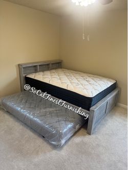 Queen bed with pullout mattress