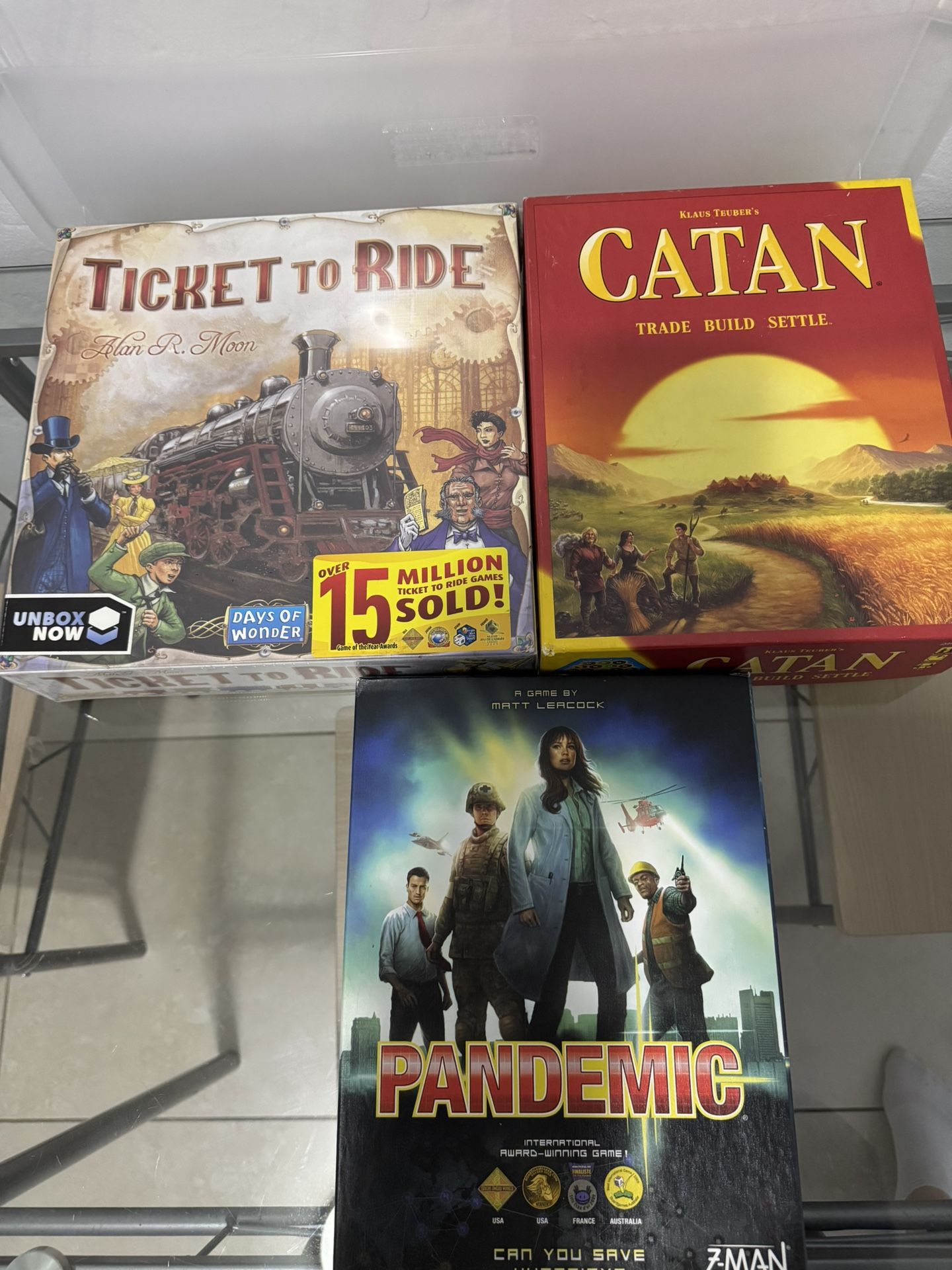 Games Catan, Pandemic And Ticket To Ride