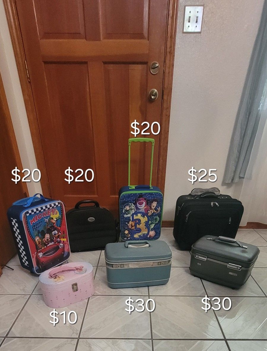 Vintage cosmetic cases $30 ea
rolling children's suitcases $20 ea
Black bag $20 
rolling computer bag $25
Disney Princesses, Mickey Mouse, Toy Story 
