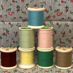 Vintage spun polyester thread spools lot of 7 Lily and Trusew assorted colors