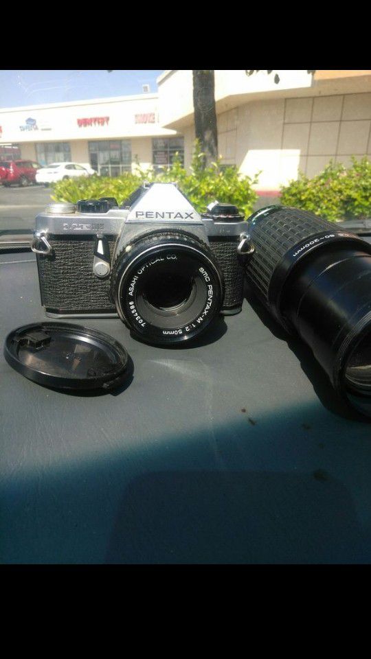 Pentax super me with 2 lenses