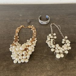 2 necklaces, 1 bracelet and 1 ring