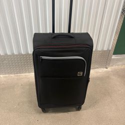 Solite four wheels expandable luggage .  29” high $40