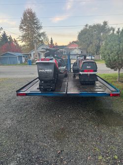 Snowmobiles and trailer