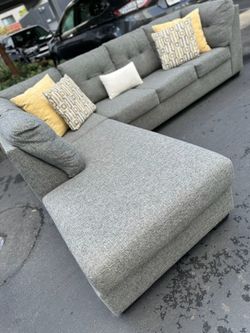 Perfect condition gray living spaces sectional couch !!