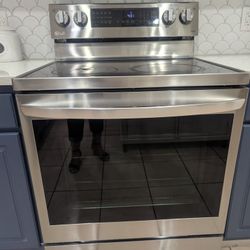 LG Stove Damaged From The Top.  It Works. The Top Needs To Be Replaced.  A Hot Pan Top Was Placed On Top And It Burst. But Can Be Replaced