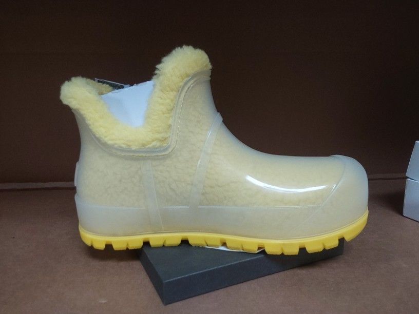 Women's yellow UGG Raincloud boots