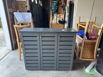Lovely grey space saving dresser. Has 4 adjustable shelves 45” x 14” plenty of space for items