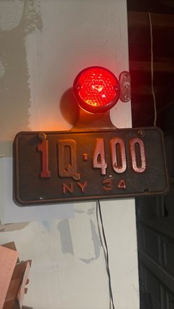 1934 New York License Plate with Red Light