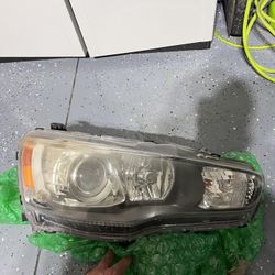 Mitsubishi Evolution X projector OEM headlight Passenger side
