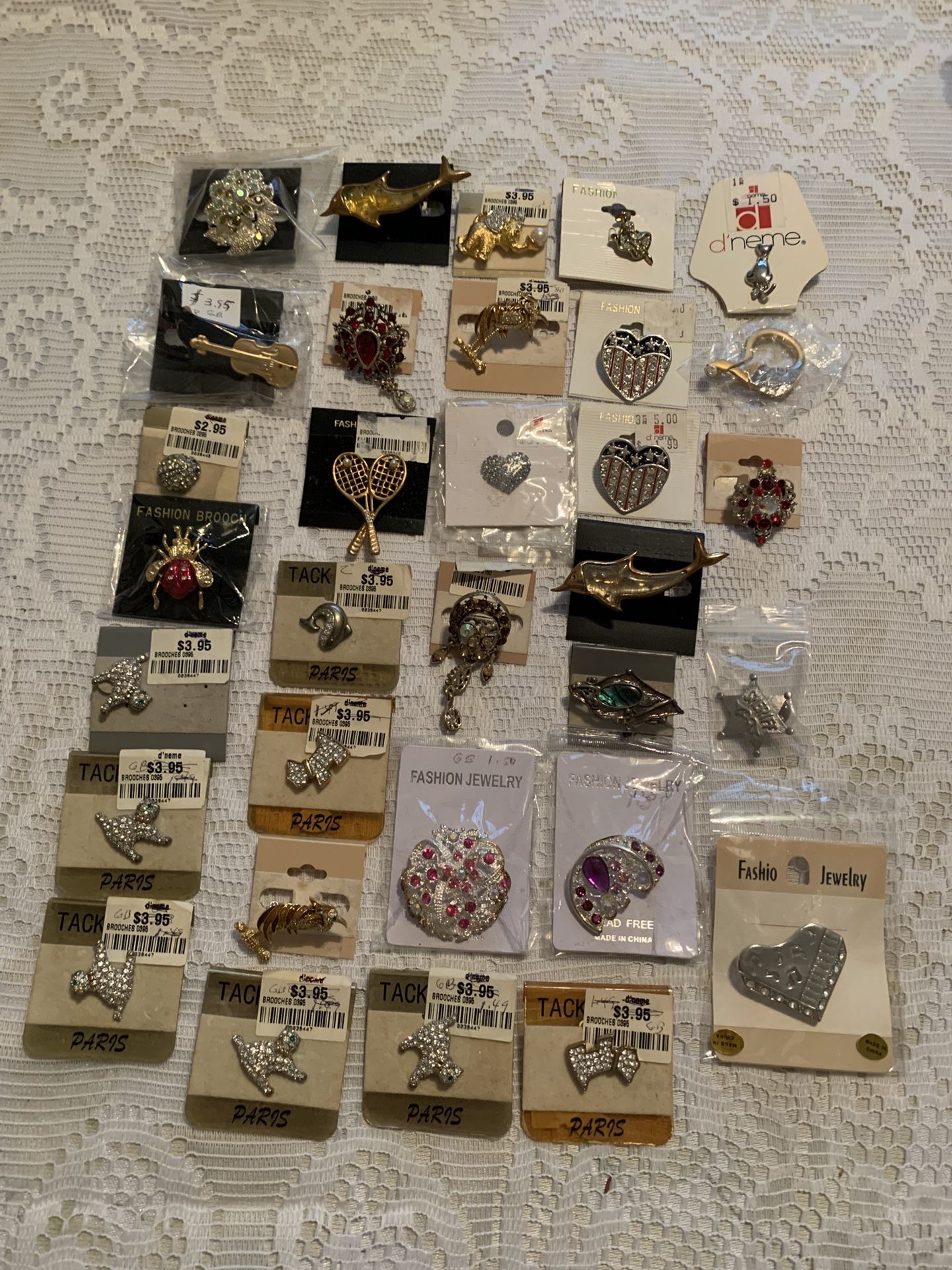 31 NEW BROOCHES AT $0.50 EACH $15.50