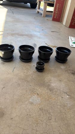 Matching black ceramic pots