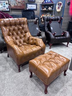 Newly upholstered golden leather sleepy hollow chair and ottoman