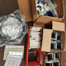 A Bunch Of Residential  Electrical Parts ( Cover Plates Box Covers Etc)