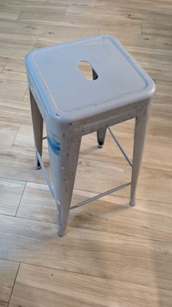 Eight metal stools 8