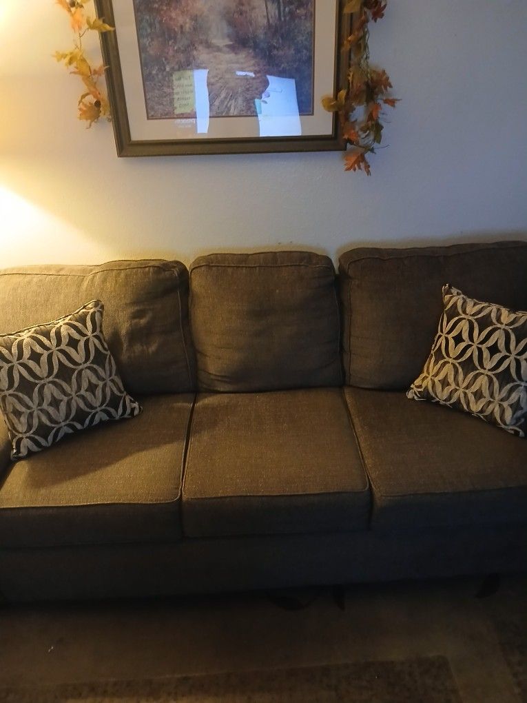 Brown Couch With 2 Pillows $150