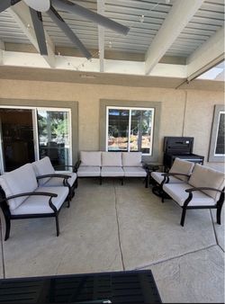 Halmuz 7-Seat Aluminum Patio Conversation Set with armrest, Firepit Table (still in box), Swivel Rocking Chairs and Sand Cushions