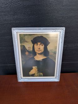 Raphael Portrait of a Young Man Framed Print