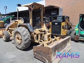 2006 Deere 210LE Skip Loader - Orange