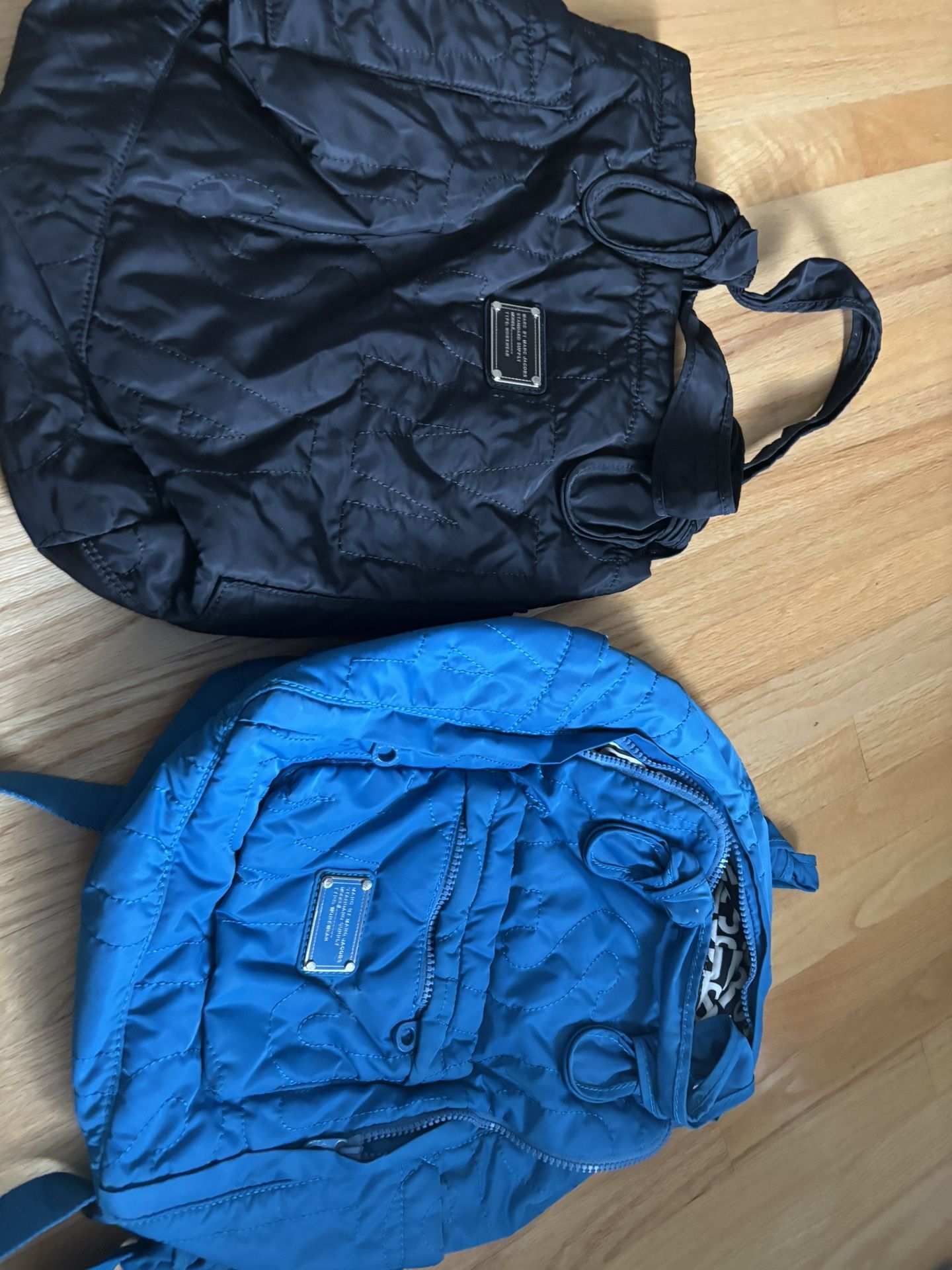 Marc Jacob’s Blue backpack And Marc Jacob’s Black Duffle Shoulder Bag 