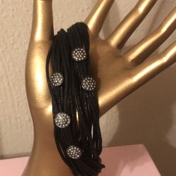 Nwt Torrid 8” multiple black leather strands with silver rhinestone round charms mixed in.