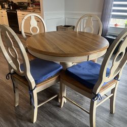 Used  Round Dining Table and 4 chairs ( cushions not included)