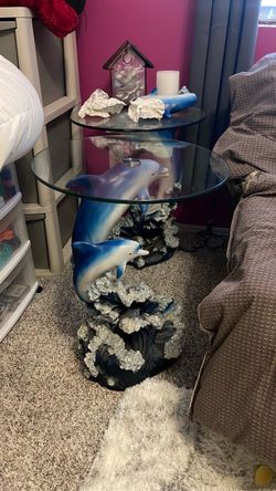 Glass Dolphin tables